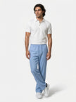 Men's linen trousers by FJØRNA, relaxed fit summer pants, full-body view showing breathable, lightweight fabric and casual style.