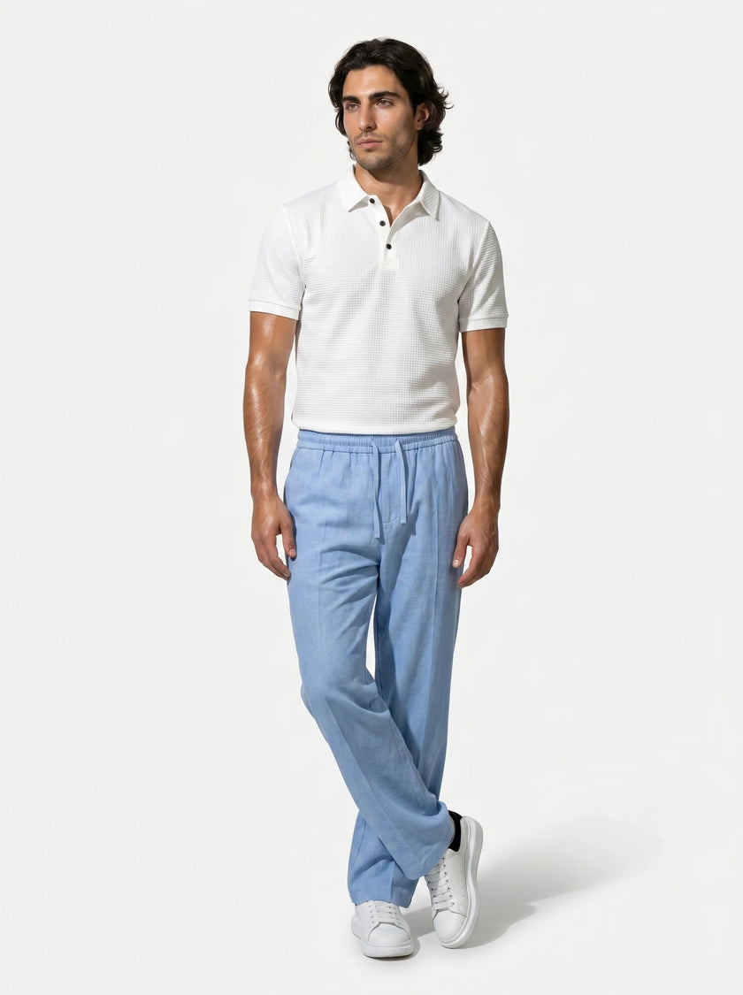 Men's linen trousers by FJØRNA, relaxed fit summer pants, full-body view showing breathable, lightweight fabric and casual style.