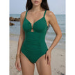 Women's slim fit sculpting V-neck swimsuit by FJØRNA, featuring a sleek design ideal for beach and pool wear.