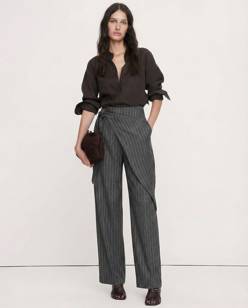 High-waist cotton wide-leg women's trousers from FJØRNA, featuring a relaxed fit and natural fabric for casual style.