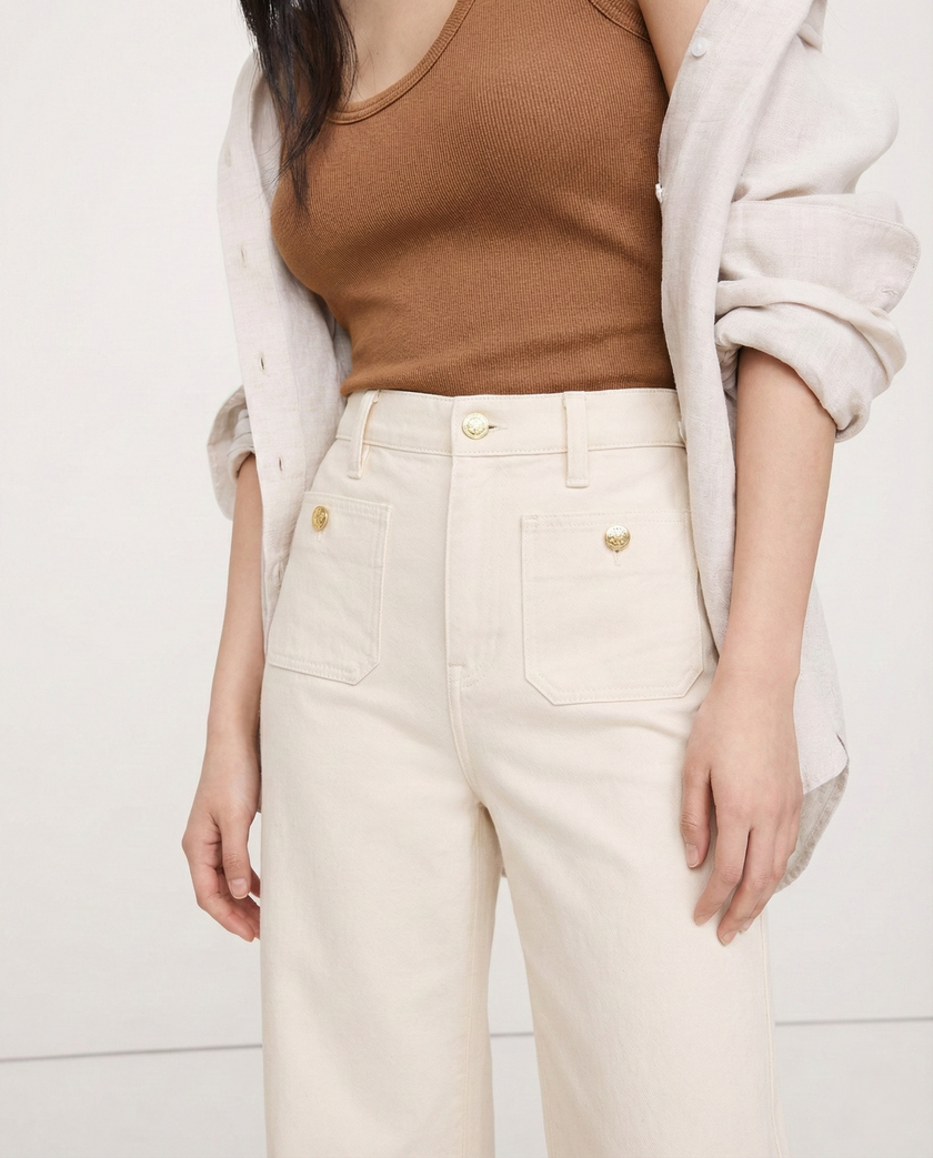 Women’s high waist cotton wide-leg jeans by FJØRNA, shown as stylish pants with a relaxed fit and classic denim look.