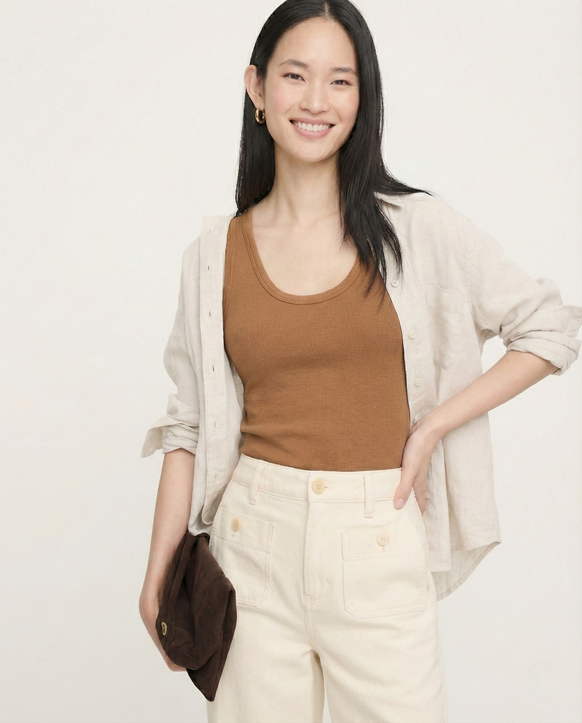 Women’s wide leg cotton jeans by FJØRNA with high waist, showcasing relaxed fit and classic denim style.