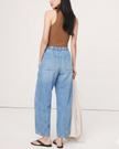 FJØRNA cotton pull-on women's jeans, stylish and comfortable pants with a classic fit, shown in a natural pose.