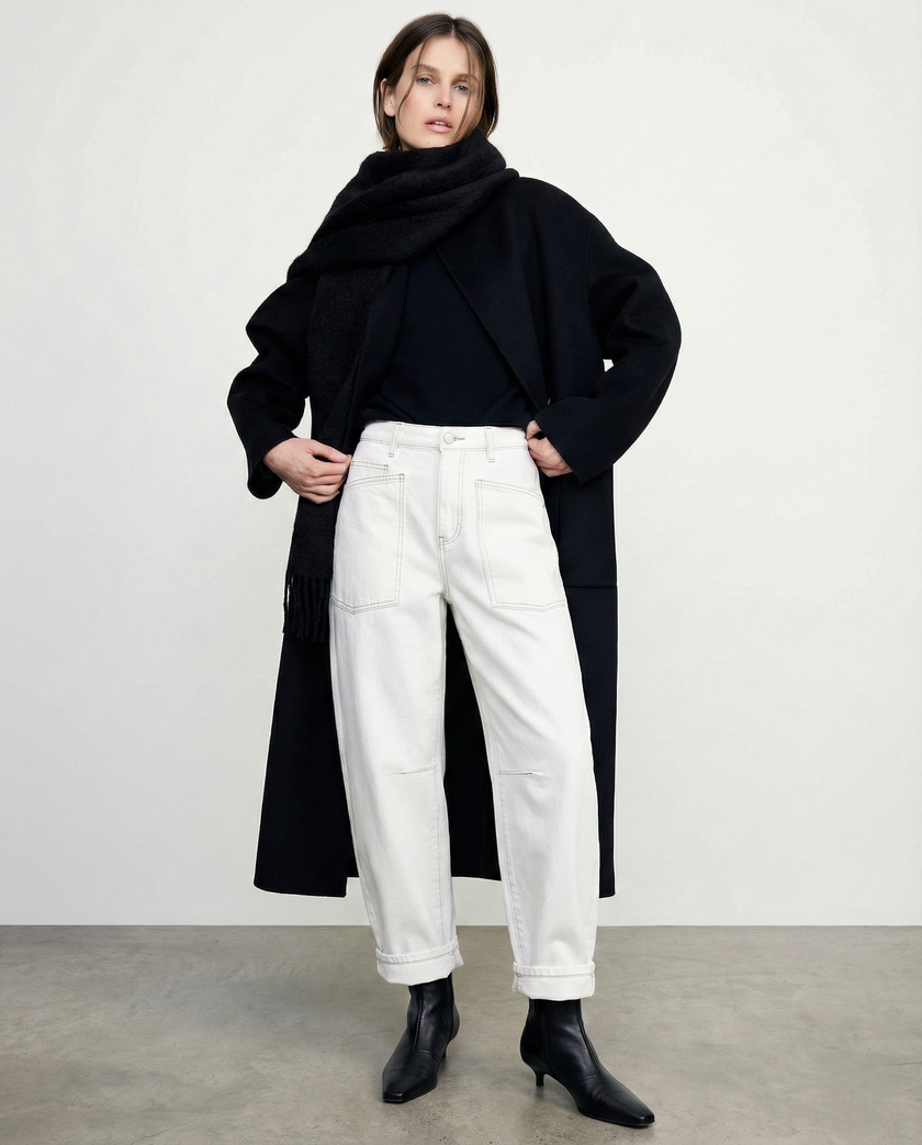FJØRNA women's denim jeans with a barrel leg cut, casual pants featuring classic blue denim and relaxed fit.