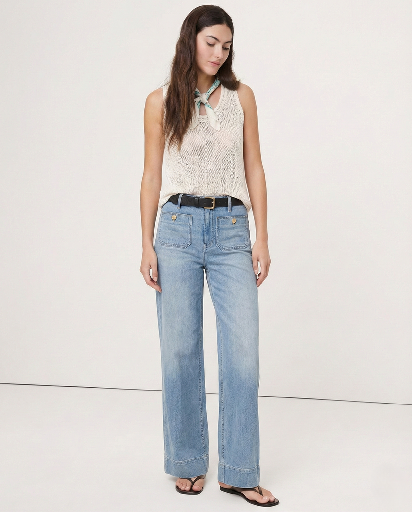 Women’s wide-leg high-waist cotton jeans by FJØRNA, featuring a relaxed fit and classic denim style.