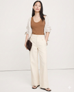 FJØRNA women's wide-leg high-waist cotton jeans featuring a relaxed fit and classic denim style.