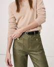 Women’s wide-leg cotton jeans by FJØRNA featuring a high waist and relaxed fit, shown in a casual front view.