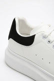 White FJØRNA men's lace-up trainers with minimalist design, ideal for everyday casual style, shown in a clean, modern shoe image.