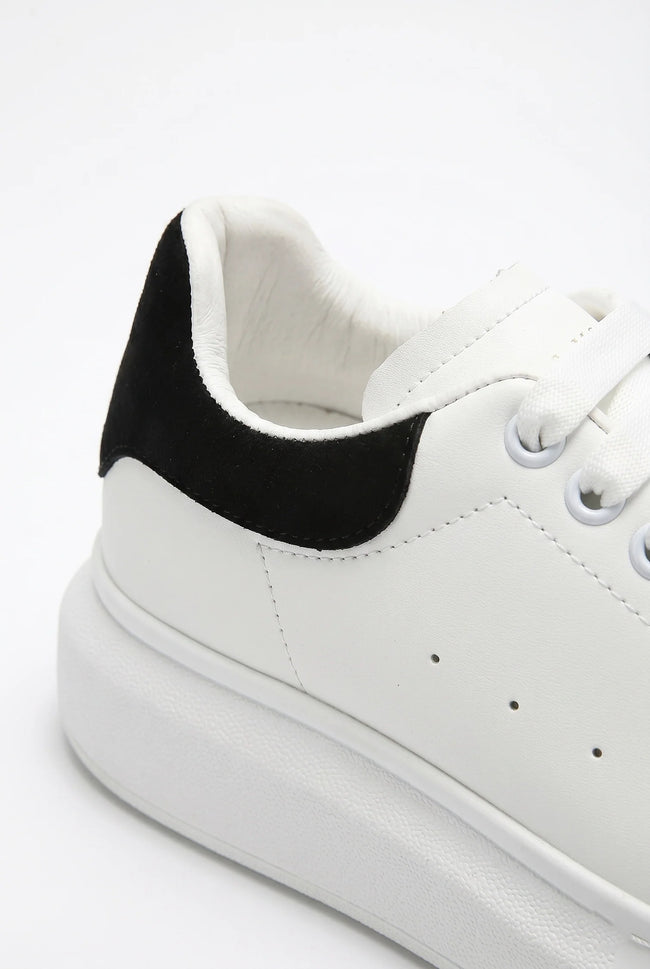 White FJØRNA men's lace-up trainers with minimalist design, ideal for everyday casual style, shown in a clean, modern shoe image.