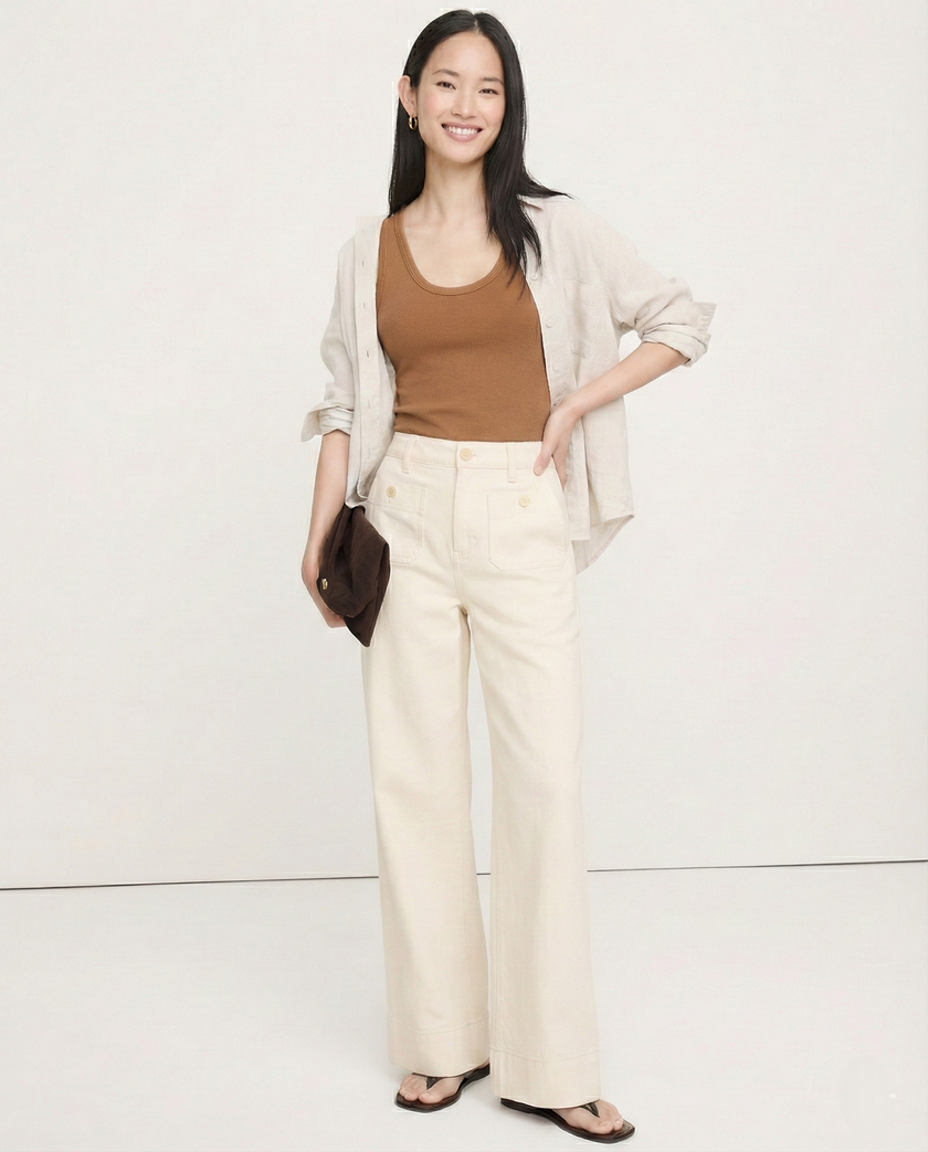 Women’s wide-leg cotton jeans by FJØRNA, high-waist pants with a relaxed fit and classic denim appearance.
