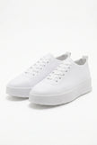 White FJØRNA men's slip-on trainers with a clean, minimalist design, perfect for casual and everyday wear.