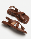 FJØRNA women's Italian leather sandals with adjustable straps, open toe design, and cross-strap style for comfortable summer wear.