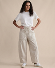 FJØRNA women's cotton pull-on jeans, stylish and comfortable pants with a classic fit, shown in a natural denim color.