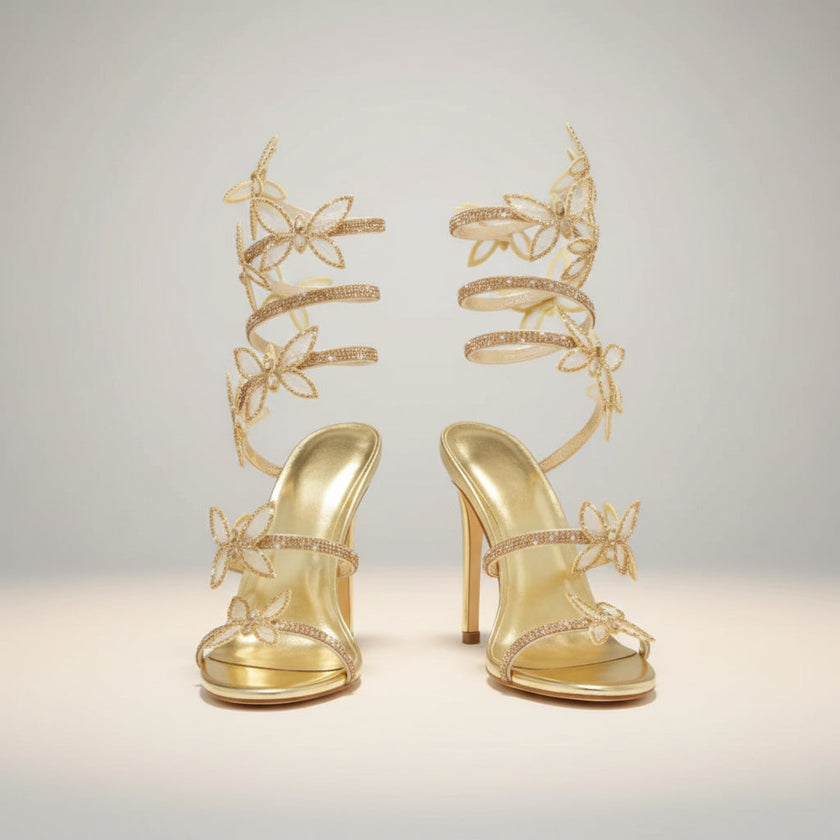 FJØRNA women's stiletto sandals with butterfly wrap design and rhinestone accents, featuring a high heel and elegant style.