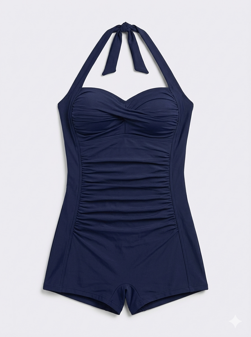 Women's shaping halter swimsuit by FJØRNA featuring pleated fit and supportive design, perfect for stylish swimming comfort.