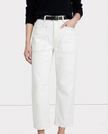 FJØRNA women's denim jeans with a barrel leg fit, showcasing classic blue denim, front pockets, and relaxed style.