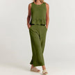 Elegant women's linen two-piece ruffle co-ord set by FJØRNA, featuring a stylish top and matching skirt with ruffle details.