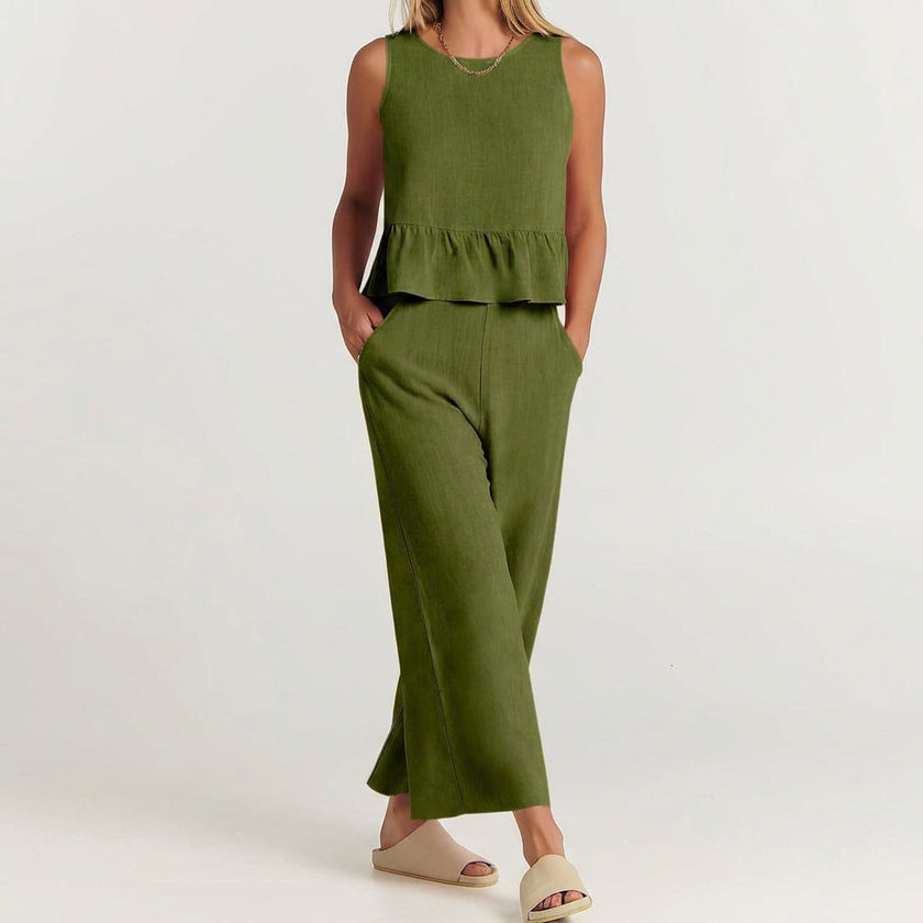Elegant women's linen two-piece ruffle co-ord set by FJØRNA, featuring a stylish top and matching skirt with ruffle details.