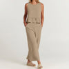 FJØRNA elegant two-piece women's linen co-ord set with ruffle details, featuring a stylish top and matching pants.