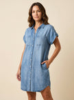 Elegant FJØRNA women's button-front evening dress with long sleeves and a fitted silhouette, ideal for formal occasions.