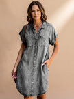 FJØRNA elegant women's evening dress with button front, featuring a stylish, flowing design perfect for formal occasions.