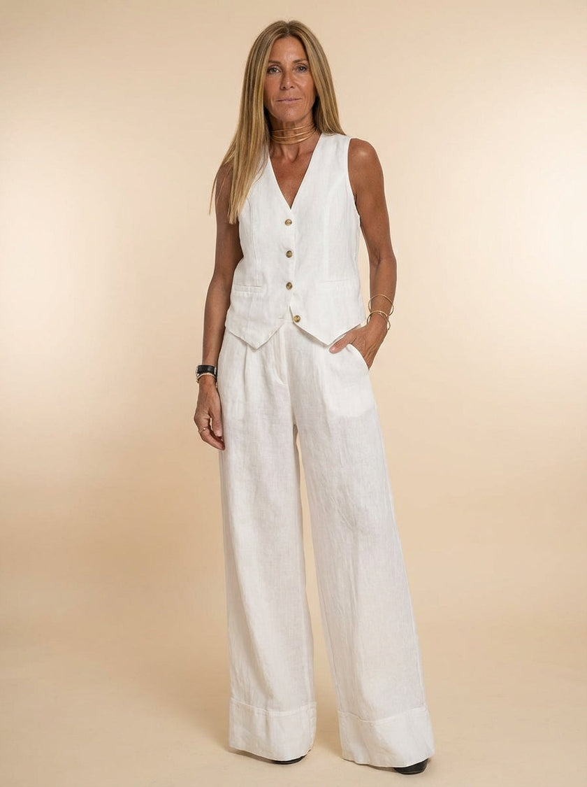 FJØRNA linen-texture vest and wide-leg trouser co-ord set, tailored fit, in neutral linen fabric, displayed on a mannequin.