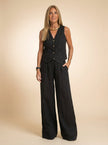 FJØRNA linen-texture vest and wide-leg trouser co-ord set, showcasing tailored design in natural fabric with structured fit.