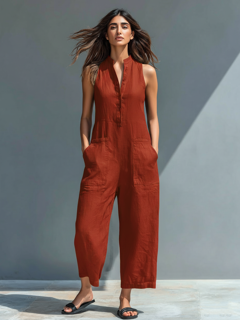 FJØRNA linen blend sleeveless jumpsuit for women with stand collar, button-up front, loose fit, and pant style.