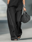 FJØRNA women's loose-fit sleeveless jumpsuit with contrast trim and wide-leg design, shown in a stylish, relaxed fit.