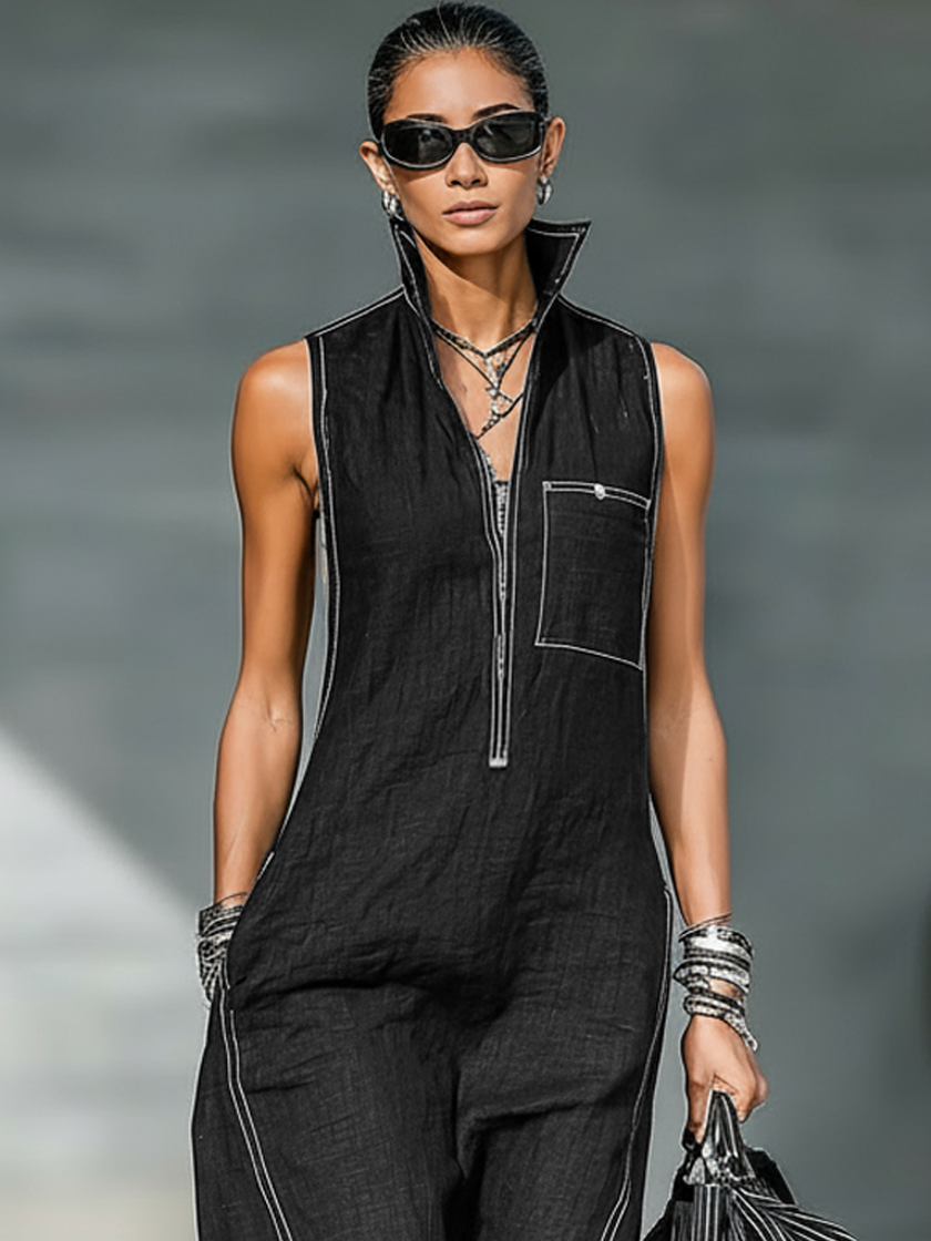 Women’s loose-fit sleeveless jumpsuit by FJØRNA, wide-leg pants with contrast trim, featuring a relaxed, stylish silhouette.