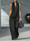 FJØRNA loose-fit sleeveless jumpsuit for women with contrast trim and wide-leg pants, casual and stylish summer outfit.