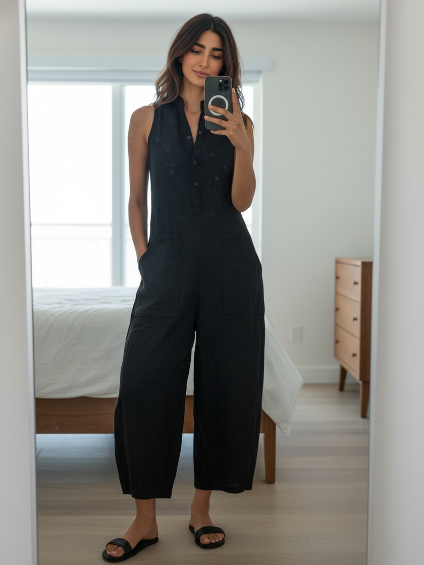 FJØRNA linen blend sleeveless jumpsuit for women with stand collar, button-up front, loose fit, and stylish pant design.