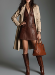 Brown eco leather zip-front mini dress for women by FJØRNA, featuring a fitted silhouette and stylish front zipper detail.
