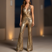Gold sequin women's backless jumpsuit by FJØRNA, featuring stylish pants and elegant, shimmering design.