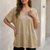 Gold sequined V-neck top for women by FJØRNA, featuring draped short sleeves and a glamorous evening style.