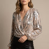 Gold V-neck long sleeve sequin blouse for women by FJØRNA, featuring a stylish summer top with shimmering details.