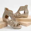 FJØRNA women's gold orthopedic heeled sandals with wedge heel and cut-out design, stylish and comfortable for warm weather.