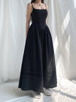 White Goth Strap Maxi Dress by FJØRNA featuring a flowing silhouette and stylish strap details.