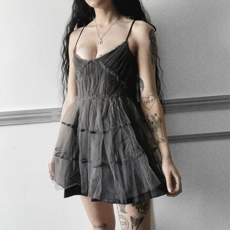 FJØRNA goth strap patchwork mini dress in white, featuring a fitted silhouette with strap details and patchwork design.