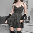 FJØRNA goth strap patchwork mini dress in white, featuring a fitted silhouette with strap details and stylish patchwork accents.