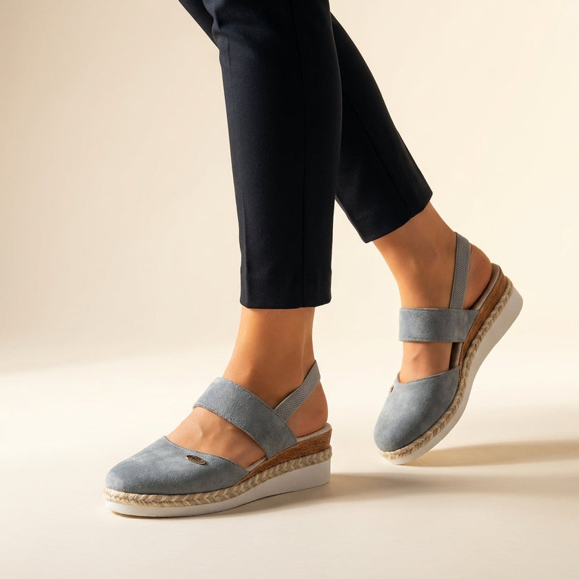 Gray orthopedic platform espadrille sandals for women by FJØRNA, featuring cushioned footbed and woven raffia sole.