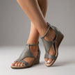Gray FJØRNA orthopedic T-strap wedge sandals for women with supportive design and adjustable straps.