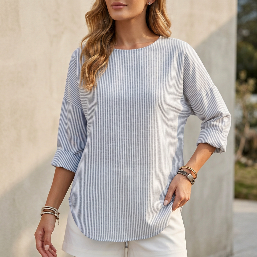 Gray relaxed-fit women's blouse with rolled sleeves and curved hem, stylish FJØRNA tops for a casual look