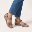 Gray FJØRNA orthopedic comfort fit sandals with adjustable straps and open toe design on a white background.