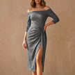 Gray off-shoulder knit midi dress with ruched details and a high slit, designed by FJØRNA, shown on a model.