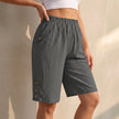 Gray linen summer shorts for women with high waist and pockets, lightweight FJØRNA casual women's clothing.