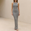 Gray ribbed bodycon high neck sleeveless maxi dress for women by FJØRNA, featuring a fitted silhouette and elegant design.