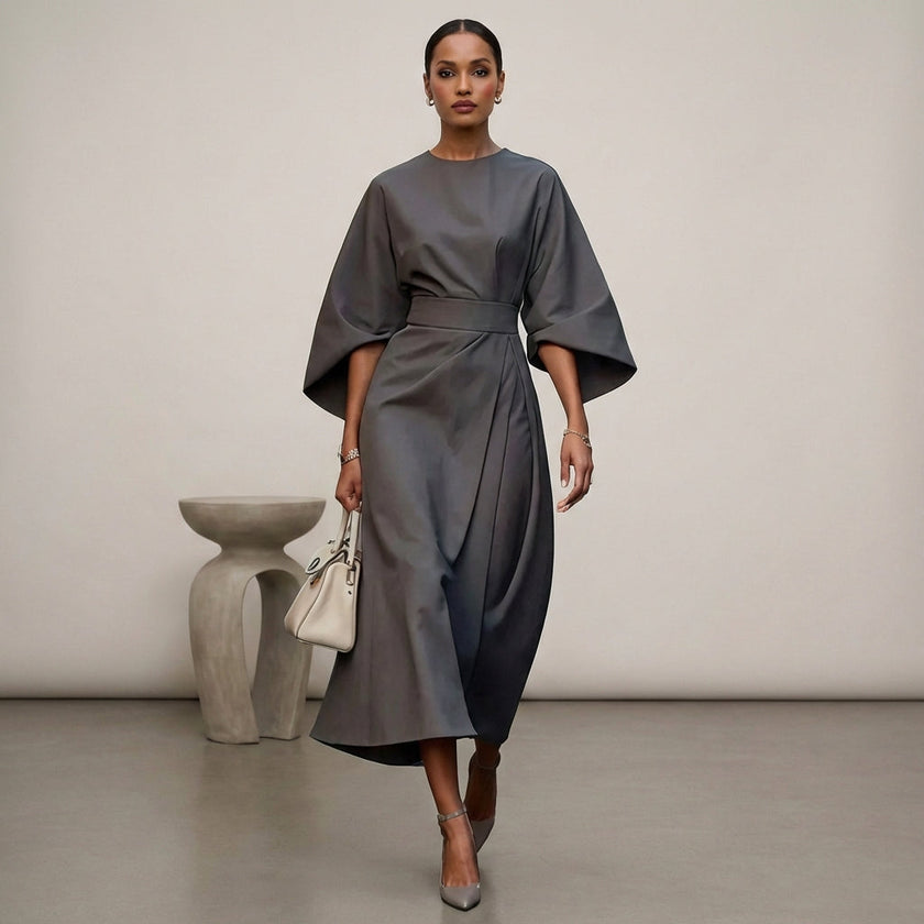 Gray FJØRNA batwing sleeve wrap maxi dress with belt and front slit, elegant and flowing for stylish occasions.