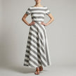 Gray FJØRNA A-line striped maxi dress with pockets, flowing fabric, and a relaxed fit for women.