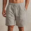 Gray men's casual drawstring shorts with side pockets, FJØRNA brand, comfortable lounge pants for everyday wear.